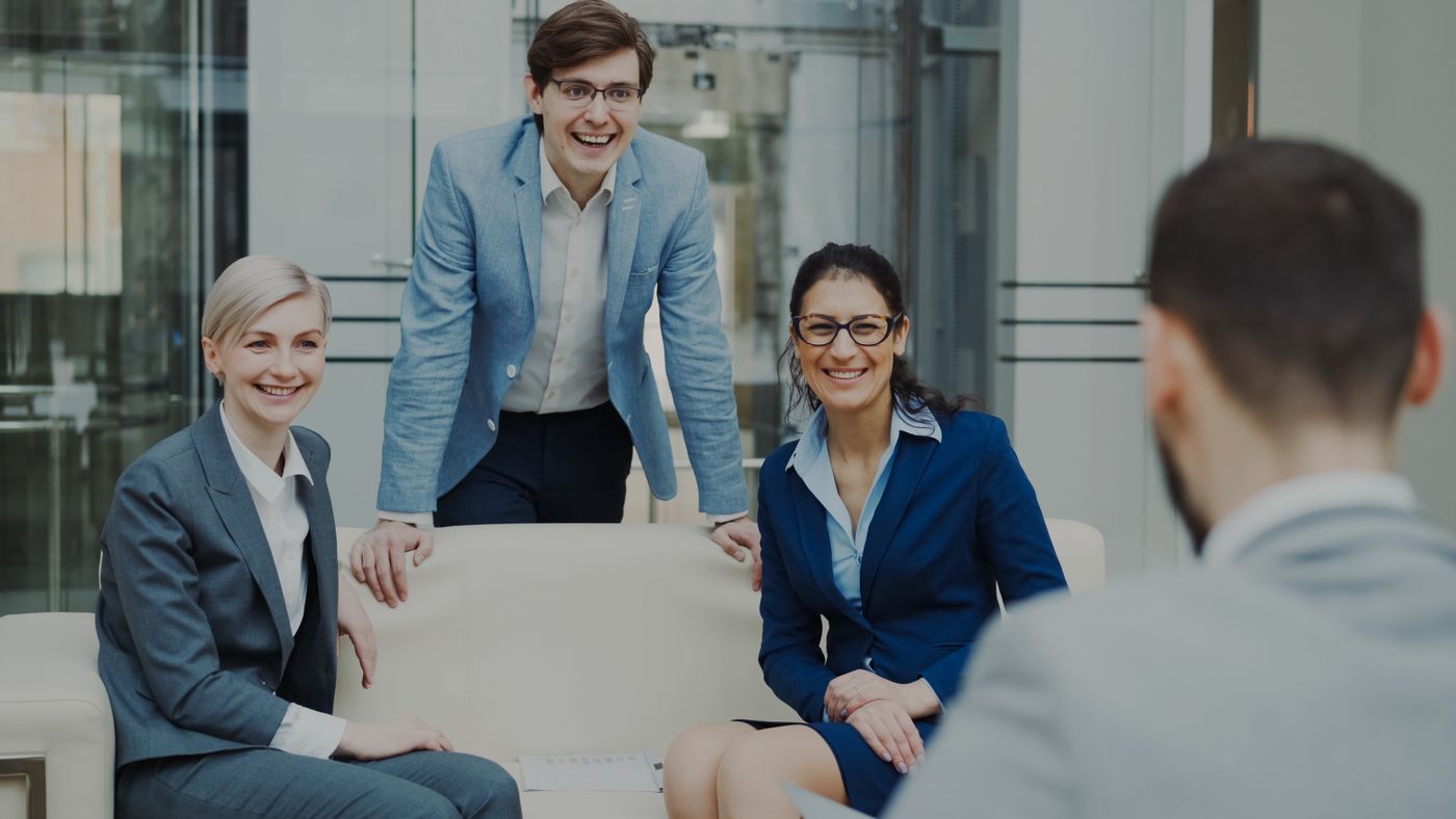 Team discussing hiring in the office
